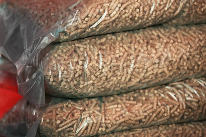 cellophane-bags-with-solid-wooden-pellets-closeup